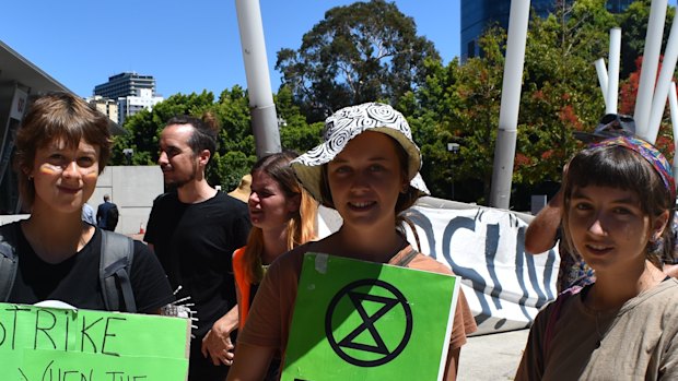 Protesters add their own imagery to the logos of the delegates at the recent Resources Technology Showcase in Perth. 