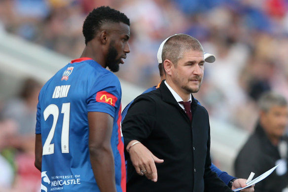 Bernie Ibini and then-Jets coach Carl Robinson, whom he followed to the Western Sydney Wanderers.