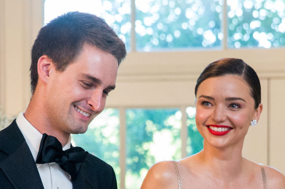 Evan Spiegel with his then-fiance Miranda Kerr at a party in 2016.