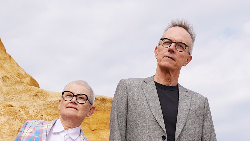 Peta and David share an office. They ring a bell when they need to speak to each other