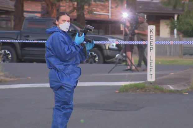 A heavy police presence remains on the Merrylands West street.