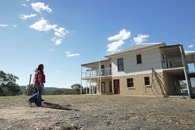 For Phil and Sharron Barker, their two-storey colonial farmhouse sits abandoned because it is incomplete, uninsurable, and structurally defective.