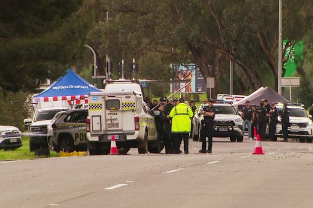 Emergency services at a scene in Adelaide after a police officer was stabbed.