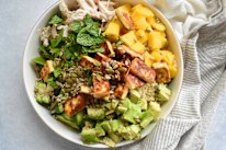 Chicken, halloumi and quinoa provide the fuel while mango and avocado bring the summer vibes.