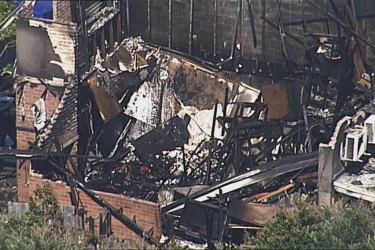The townhouse fire at Myola Street in the Logan suburb of Browns Plains that killed Langham and Hely.