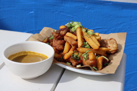 The Taphouse spice bag features marinated chicken, chips and house-made curry sauce.