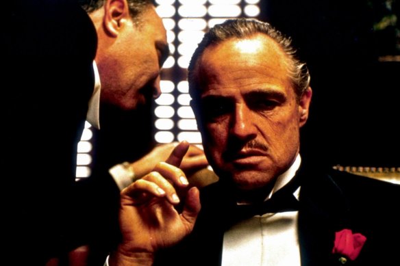 Don Corleone (Marlon Brando) cannot refuse a request on his daughter’s wedding day, and Bonasera (Frank Puglia) asks for one in a scene from The Godfather.