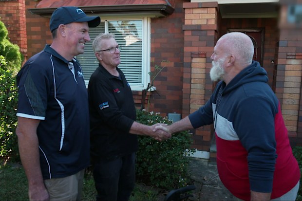 Julian Dirou and Greg Bartlett were happy to help fix Frank’s roof for free.