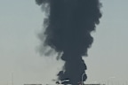 Smoke rises from Riyadh airport after an air strike claimed by Houthi rebels.