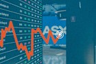 The ASX 200 is weaker on lower mining, bank stocks.