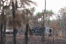 Both cars burst into flames after the crash.