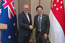 Anthony Albanese and Lawrence Wong.