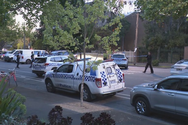 A heavy police presence remains on the Carlton street as forensics try to piece together the circumstances surrounding the man’s death.