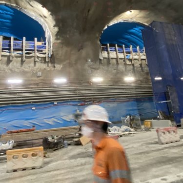 Three pedestrian connections at the Roma Street underground rail station are emerging where rail commuters will walk onto a mezzanine level and catch escalators down to the platform 27 metres below ground.