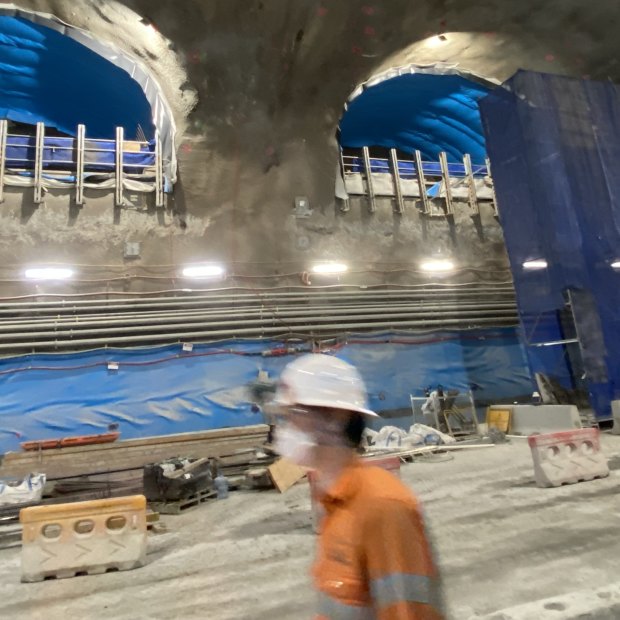 Three pedestrian connections at the Roma Street underground rail station are emerging where rail commuters will walk onto a mezzanine level and catch escalators down to the platform 27 metres below ground.