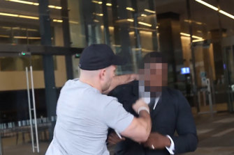 A still from a video of an alleged attack on a Channel Nine security guard in Melbourne on Monday night.