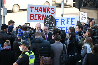 Bernie Finn was at state parliament with his supporters on Tuesday, but did not attend the Liberal party room meeting.