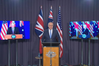 Prime Minister Scott Morrison, UK Prime Minister Boris Johnson and US President Joe Biden at their joint press conference.