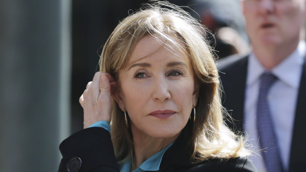 Actress Felicity Huffman arrives at federal court in Boston.