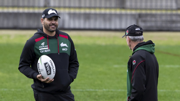 Inglis sharing a chat with his former coach, Wayne Bennett.