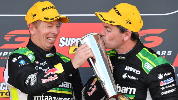 King Craig: Lowndes kisses the trophy after winning his seventh race at Mount Panorama.