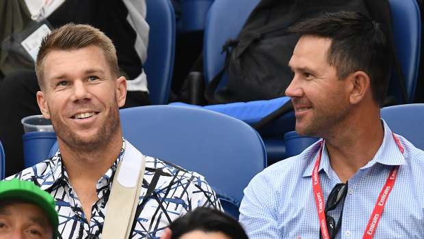 Return serve: Dave Warner, wearing a sling following elbow surgery, and Ricky Ponting at last month's Australian Open.