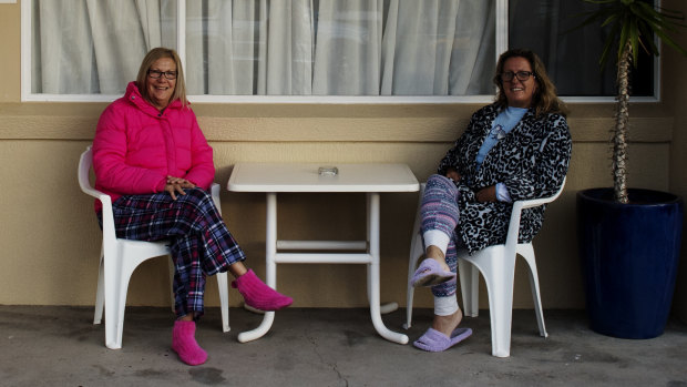 Lisa De Man and Tammy Becroft, both from Queensland, are staying at the Las Vegas Motel in Tweed Heads until traffic congestion eases.