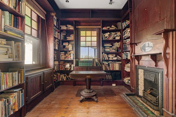 Part of the property’s appeal was the library with its floor-to-ceiling bookshelves. 