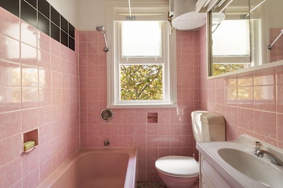 Came for the parquetry floors, stayed for the original pink and black bathroom. This apartment in a Spanish Mission building won hearts and minds at auction.