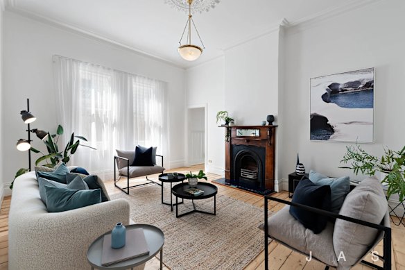 A first home buyer couple paid $115,000 over reserve for two-bedroom Footscray house. 