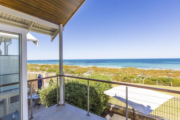 This three bedroom, two bathroom home in Ledge Point has panoramic views of the ocean.
