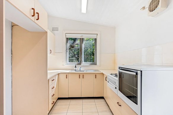 The house at 25 Francis Street has some original features, but not in the serviceable if dated kitchen.
