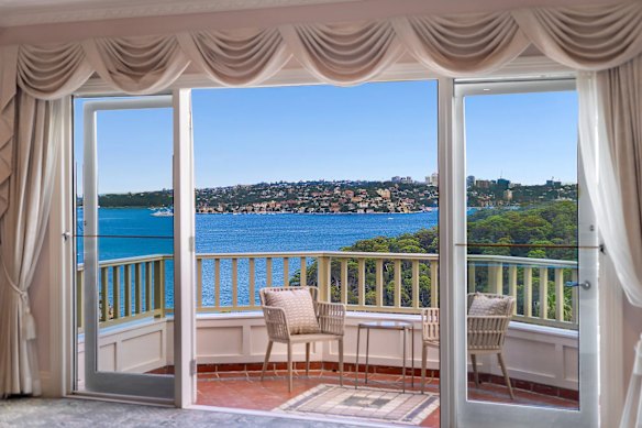 There are sun-drenched balconies and expansive lawns with views over Taylors Bay.