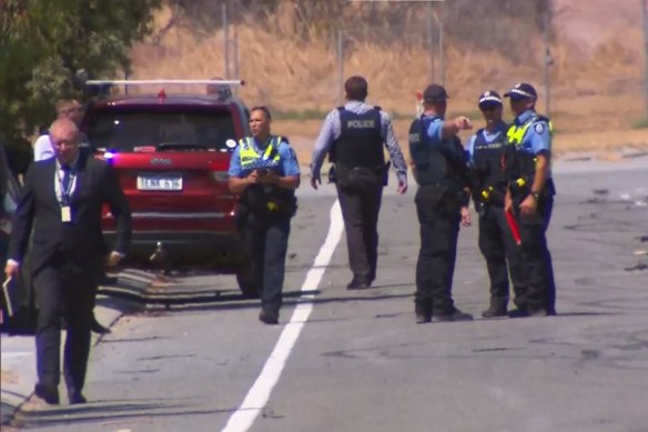 Police at the scene of the shooting in Port Kennedy on Monday.