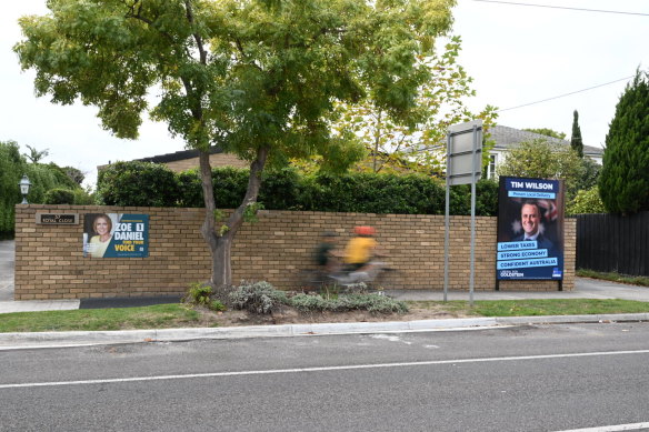 Duelling campaign signs  in Sandringham. 