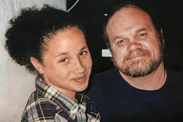 A teenage Meghan with her father.
