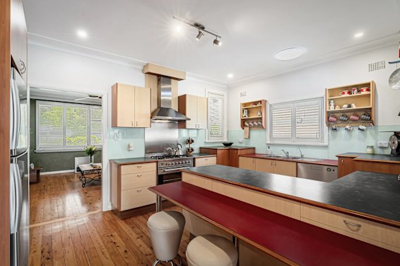 The spacious kitchen at 39 Acacia Road connects living areas at the front and area of the property.