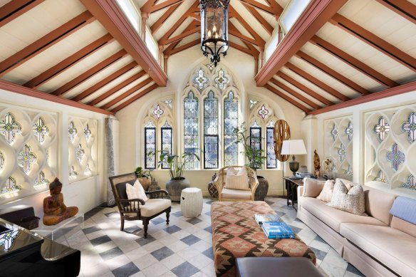 The nine-bedroom residence includes a converted chapel with stained-glass windows.