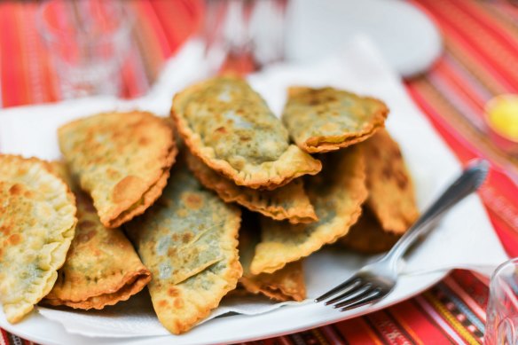Unmissable: kalitsounia, mini cheese pies drizzled with honey.