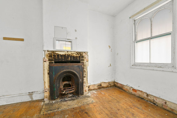 The two-bedroom home was marketed as a “renovator’s delight”.