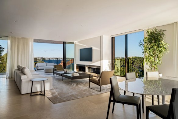 The three-bedroom, two-bathroom penthouse apartment is in a collection of 24 harbourfront residences. Marble, limestone and expansive glass adorn the space.