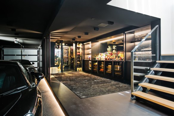 The property comes with a cocktail bar, cellar and showroom-style garage.