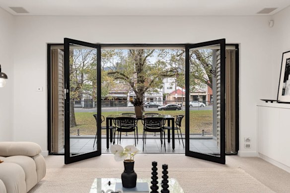 The balcony view onto leafy Macarthur Square.
