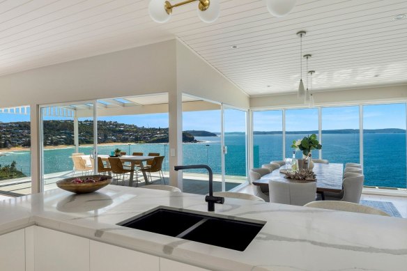 The Whale Beach house sold by Cedric and Deborah Lee this week is next door to the construction job of Jennifer Hawkins and Jake Wall.