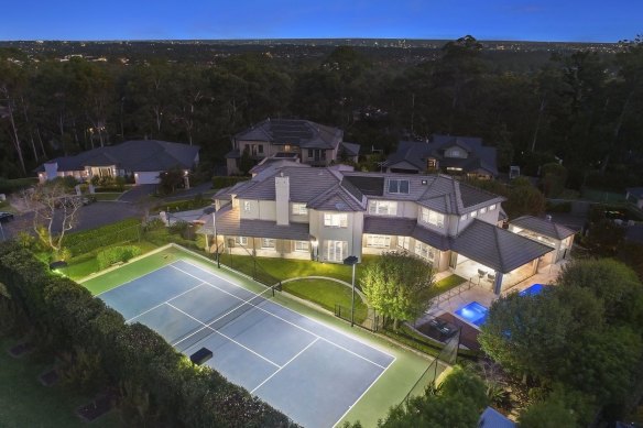 This West Pennant Hills acreage with a swimming pool, tennis court, billiard room and manicured gardens set a suburb record of $5.5 million when purchased in 2021 by Gareth Hales.