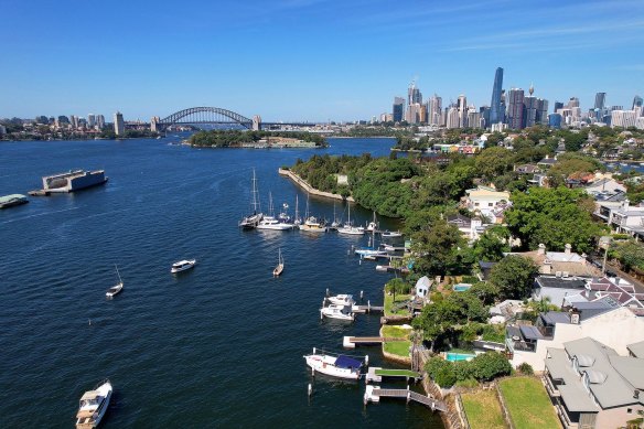 A three-bedroom waterfront home on Birchgrove's Wharf Road, with a private jetty, sold for $8,115,000.  A three-bedroom home across the street sold for $3.9 million.