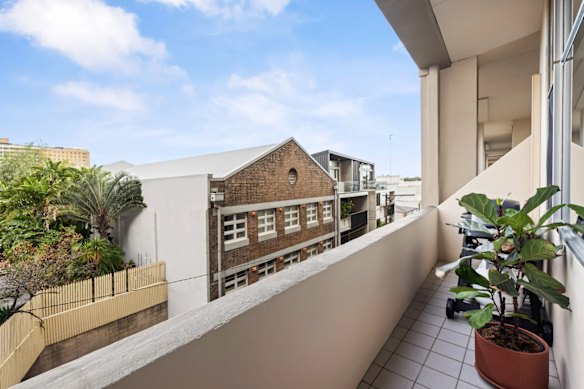The apartment’s warehouse character and the building’s reputation helped generate interest during the campaign, the agent said.