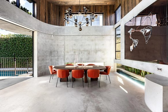 Interiors have an industrial aesthetic with concrete, copper and reclaimed timber. 
