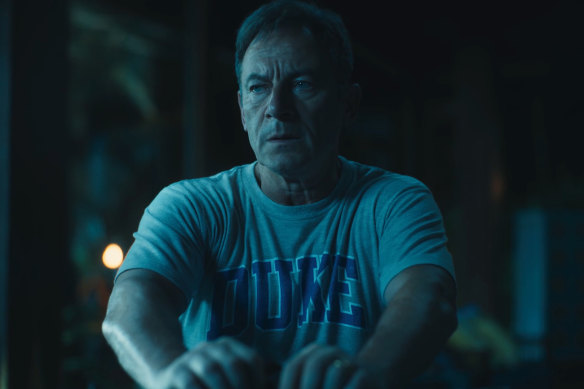 The tranqued Timothy (Jason Isaacs) has lost the gun, but could be in the line of fire.
