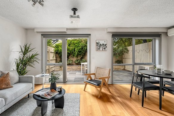 A singe mother bought the two-bedroom townhouse at Saturday’s auction. 
